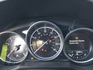 2021 Mazda 6 Carbon Edition with VIN JM1GL1WY9M1619981, listed as a IAAI auction lot 41751194 with 32,083 mi miles and . Bid and sale history available at DreamBid. Image 7.