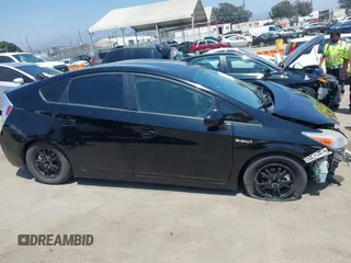 2015 Toyota Prius Four z VIN JTDKN3DU3F1914593, wystawiony jako IAAI lot #42477785 z przebiegiem 127 244 mil mil oraz . Historia ofert i sprzedaży dostępna na DreamBid. Obrazek 14.