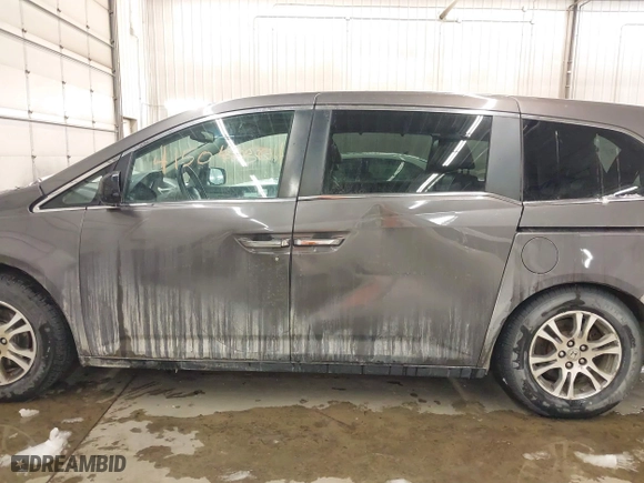 2012 Honda Odyssey EX-L with VIN 5FNRL5H66CB101151, listed as a IAAI auction lot 41504250 with 261,836 mi miles. Bid and sale history available at carsss.com. Image 14.