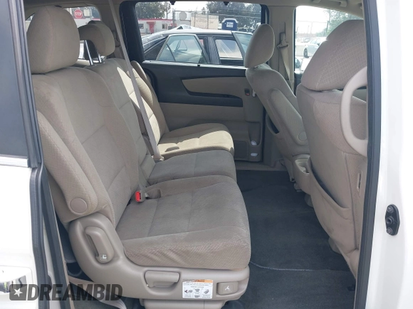 2016 Honda Odyssey SE with VIN 5FNRL5H33GB043303, listed as a IAAI auction lot 42215233 with 67,097 mi miles and . Bid and sale history available at DreamBid. Image 8.