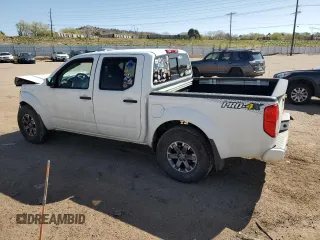 2018 Nissan Frontier Pro-4X with VIN 1N6AD0EV1JN715111, listed as a Copart auction lot 54012255 with 127,409 mi miles and Salvage title. Bid and sale history available at DreamBid. Image 2.