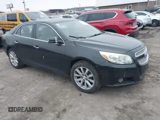 2013 Chevrolet Malibu LTZ with VIN 1G11H5SA1DF123107, listed as a IAAI auction lot 41470772 with 202,752 mi miles and . Bid and sale history available at DreamBid. Image 1.