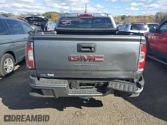 2021 GMC Canyon 4WD Elevation with VIN 1GTG6CEN0M1206440, listed as a Copart auction lot 75977144 with 43,943 mi miles and Salvage Title. Bid and sale history available at carsss.com. Image 6.