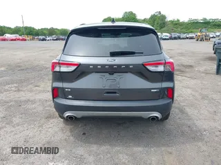2020 Ford Escape SE z VIN 1FMCU9G68LUB54383, wystawiony jako IAAI lot #42356897 z przebiegiem 69 587 mil mil oraz . Historia ofert i sprzedaży dostępna na DreamBid. Obrazek 17.