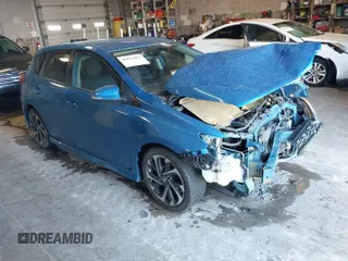 2017 Toyota Corolla iM with VIN JTNKARJE0HJ527896, listed as a IAAI auction lot 41844003 with 157,286 mi miles. Bid and sale history available at carsss.com. Image 1.