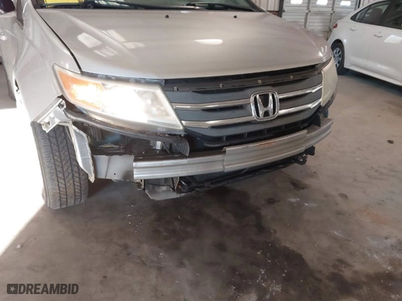 2012 Honda Odyssey EX-L with VIN 5FNRL5H61CB147311, listed as a IAAI auction lot 41607643 with 244,575 mi miles. Bid and sale history available at carsss.com. Image 18.