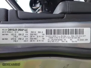 2015 Jeep Grand Cherokee Altitude with VIN 1C4RJFAG0FC657942, listed as a IAAI auction lot 41899793 with 102,277 mi miles. Bid and sale history available at carsss.com. Image 9.