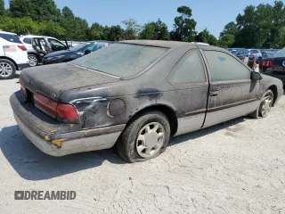 1995 Ford Thunderbird LX z VIN 1FALP62W2SH151865, wystawiony jako Copart lot #68608984 z przebiegiem 75 272 mil mil oraz Czysty tytuł • Clean title. Historia ofert i sprzedaży dostępna na DreamBid. Obrazek 3.