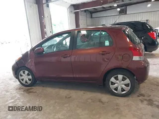 2010 Toyota Yaris z VIN JTDKT4K37A5289171, wystawiony jako IAAI lot #42436707 z przebiegiem 118 810 mil mil oraz . Historia ofert i sprzedaży dostępna na DreamBid. Obrazek 14.