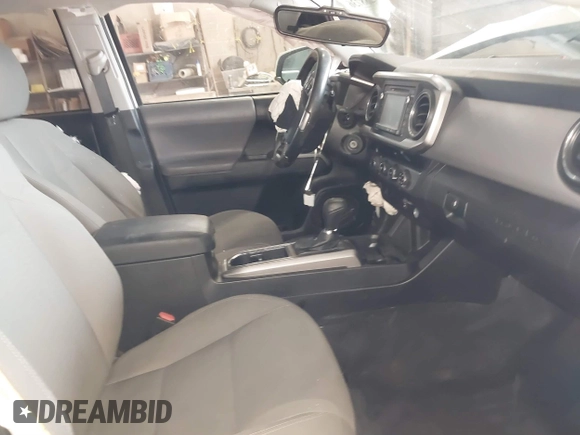 2016 Toyota Tacoma SR5 with VIN 3TMDZ5BN2GM007990, listed as a IAAI auction lot 41288736 with 76,179 mi miles. Bid and sale history available at carsss.com. Image 5.