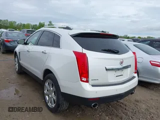 2014 Cadillac SRX Performance Collection with VIN 3GYFNCE34ES519059, listed as a IAAI auction lot 42237351 with 80,578 mi miles and . Bid and sale history available at DreamBid. Image 3.