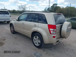 2008 Suzuki Grand Vitara Luxury z VIN JS3TD947384100130, wystawiony jako IAAI lot #41713955 z przebiegiem 180 631 mil mil oraz . Historia ofert i sprzedaży dostępna na DreamBid. Obrazek 3.
