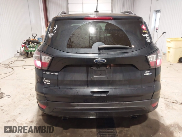 2017 Ford Escape SE with VIN 1FMCU9GD8HUF04133, listed as a IAAI auction lot 41390354 with 93,139 mi miles. Bid and sale history available at carsss.com. Image 16.