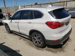 2018 BMW X1 sDrive28i with VIN WBXHU7C31J5H44190, listed as a Copart auction lot 67802544 with 96,973 mi miles and Clean Title. Bid and sale history available at carsss.com. Image 2.