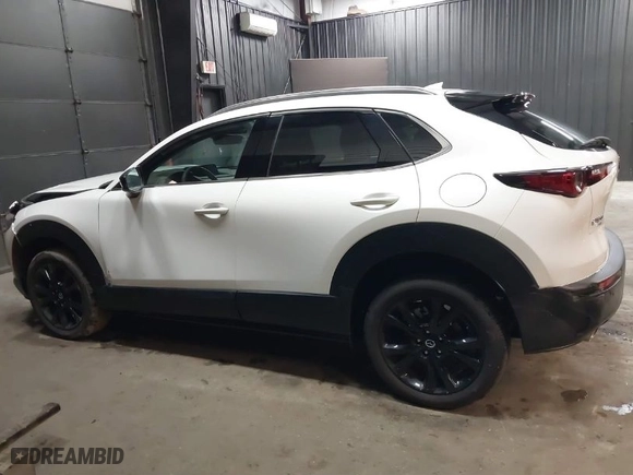 2024 Mazda CX-30 2.5 Turbo Premium Package with VIN 3MVDMBDY7RM706554, listed as a IAAI auction lot 41553002 with 2,817 mi miles. Bid and sale history available at carsss.com. Image 14.