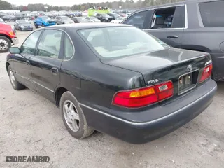 1999 Toyota Avalon XL with VIN 4T1BF18B2XU330305, listed as a IAAI auction lot 41717284 with NaN miles. Bid and sale history available at carsss.com. Image 3.