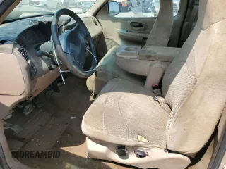 1999 Ford F-150 with VIN 1FTRF17W8XKA37849, listed as a Copart auction lot 58383265 with Not provided miles and Salvage title. Bid and sale history available at DreamBid. Image 7.