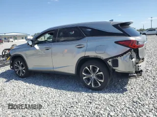 2018 Lexus RX 450hL Premium with VIN JTJDGKCAXJ2004427, listed as a Copart auction lot 55213625 with 94,557 mi miles and Salvage title. Bid and sale history available at DreamBid. Image 2.
