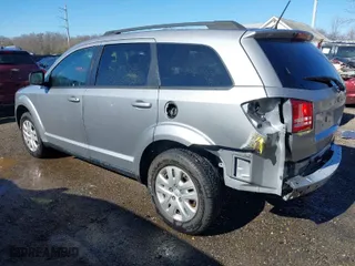 2018 Dodge Journey SE with VIN 3C4PDCAB7JT218266, listed as a IAAI auction lot 41837637 with 159,592 mi miles. Bid and sale history available at carsss.com. Image 3.