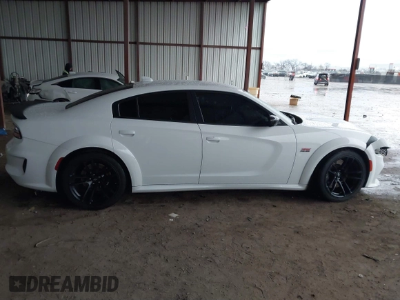 2023 Dodge Charger Scat Pack Widebody with VIN 2C3CDXGJ9PH516473, listed as a IAAI auction lot 41188167 with 38,021 mi miles and . Bid and sale history available at DreamBid. Image 13.