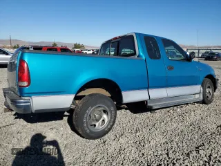 1997 Ford F-150 with VIN 1FTDX1725VKC16240, listed as a Copart auction lot 80091964 with 115,205 mi miles and Salvage title. Bid and sale history available at DreamBid. Image 3.