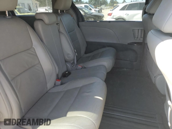 2015 Toyota Sienna XLE with VIN 5TDYK3DC7FS630252, listed as a Copart auction lot 65182965 with 90,764 mi miles and Salvage title. Bid and sale history available at DreamBid. Image 11.