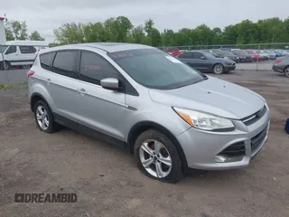2014 Ford Escape SE z VIN 1FMCU9GX9EUC35713, wystawiony jako IAAI lot #42323161 z przebiegiem 169 393 mil mil oraz . Historia ofert i sprzedaży dostępna na DreamBid. Obrazek 1.