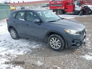 2013 Mazda CX-5 Sport z VIN JM3KE2BE9D0156274, wystawiony jako IAAI lot #41624466 z przebiegiem 159 017 mil mil oraz . Historia ofert i sprzedaży dostępna na DreamBid. Obrazek 1.