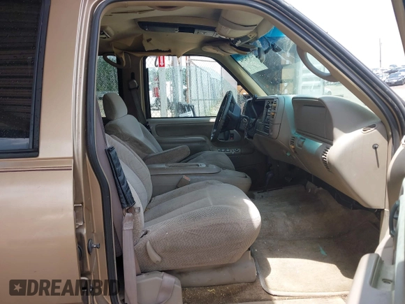 1999 Chevrolet Suburban with VIN 1GNFK16RXXJ416360, listed as a IAAI auction lot 42670294 with 319,691 mi miles and . Bid and sale history available at DreamBid. Image 5.