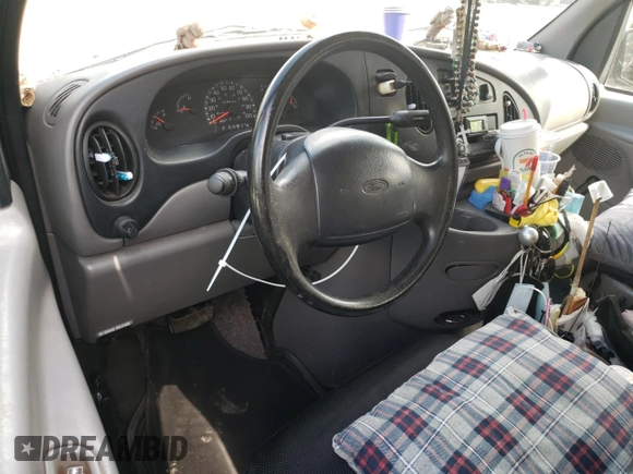 1999 Ford Econoline Passenger XL with VIN 1FBSS31LXXHA39417, listed as a Copart auction lot 52817645 with 109,930 mi miles and Salvage title. Bid and sale history available at DreamBid. Image 8.