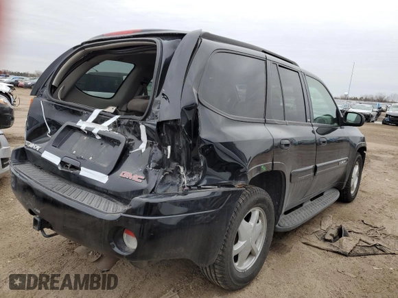 2003 GMC Envoy SLE with VIN 1GKDT13S532122751, listed as a Copart auction lot 46166415 with 139,621 mi miles and Salvage Title. Bid and sale history available at carsss.com. Image 3.