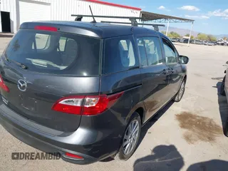 2013 Mazda 5 Sport with VIN JM1CW2BL4D0145725, listed as a IAAI auction lot 42190177 with 143,209 mi miles and . Bid and sale history available at DreamBid. Image 4.