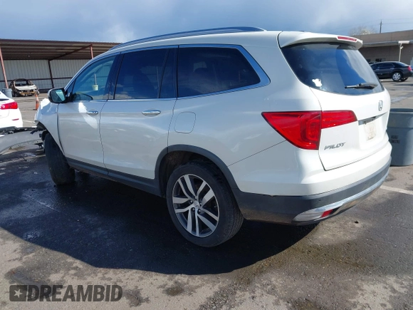2017 Honda Pilot Elite with VIN 5FNYF6H06HB041609, listed as a IAAI auction lot 41804477 with 134,535 mi miles and . Bid and sale history available at DreamBid. Image 3.
