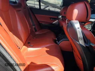2015 BMW M6 z VIN WBS6C9C50FD467779, wystawiony jako Copart lot #56702794 z przebiegiem 78 259 mil mil oraz Szkody całkowita. Historia ofert i sprzedaży dostępna na DreamBid. Obrazek 10.