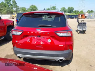 2020 Ford Escape SEL z VIN 1FMCU0H6XLUB62303, wystawiony jako IAAI lot #42646790 z przebiegiem 70 895 mil mil oraz . Historia ofert i sprzedaży dostępna na DreamBid. Obrazek 17.