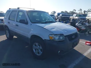 2007 Ford Escape XLT with VIN 1FMCU03187KA65050, listed as a IAAI auction lot 41642057 with 182,599 mi miles. Bid and sale history available at carsss.com. Image 1.