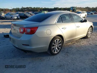 2014 Chevrolet Malibu LTZ with VIN 1G11H5SL9EF299826, listed as a IAAI auction lot 40955208 with 213,203 mi miles and . Bid and sale history available at DreamBid. Image 4.