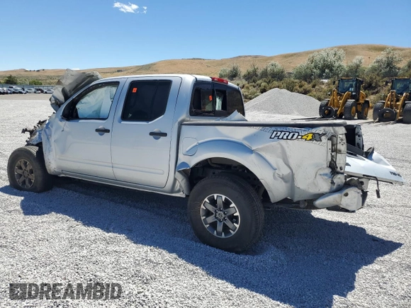 2018 Nissan Frontier Pro-4X with VIN 1N6AD0EV2JN743841, listed as a Copart auction lot 64862954 with Not provided miles and Salvage title. Bid and sale history available at DreamBid. Image 2.