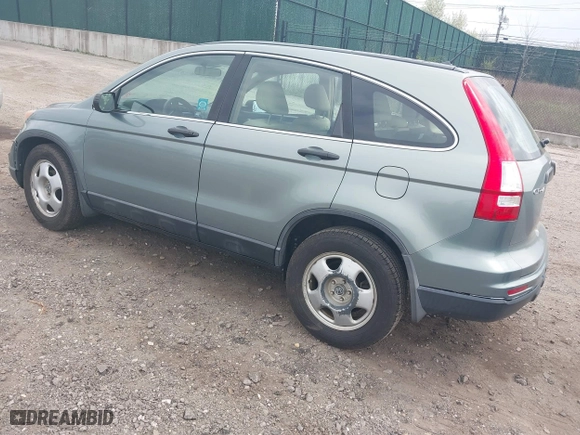 2011 Honda CR-V LX with VIN 5J6RE3H37BL008665, listed as a IAAI auction lot 42060005 with 128,447 mi miles. Bid and sale history available at carsss.com. Image 3.