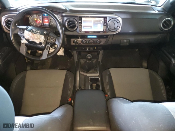 2022 Toyota Tacoma 4WD SR with VIN 3TYCZ5AN0NT055986, listed as a Copart auction lot 50165995 with 52,628 mi miles and Salvage Title. Bid and sale history available at carsss.com. Image 8.