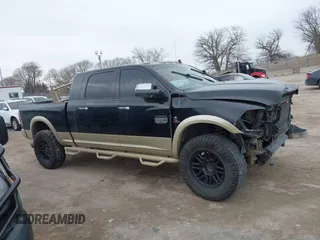 2013 Ram 2500 Longhorn with VIN 3C6UR5PL8DG535266, listed as a IAAI auction lot 41656359 with 202,487 mi miles and . Bid and sale history available at DreamBid. Image 14.