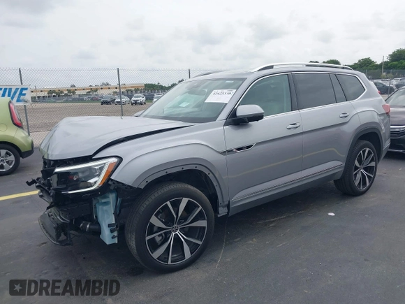 2024 Volkswagen Atlas SEL Premium R-Line with VIN 1V2FR2CA7RC595004, listed as a IAAI auction lot 42425330 with 16,171 mi miles and . Bid and sale history available at DreamBid. Image 2.