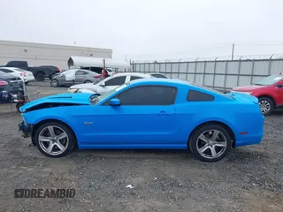 2013 Ford Mustang GT with VIN 1ZVBP8CF4D5268218, listed as a IAAI auction lot 41555868 with 219,385 mi miles. Bid and sale history available at carsss.com. Image 14.