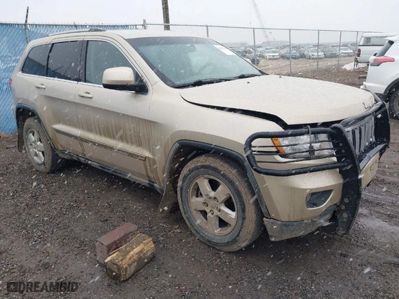 2011 Jeep Grand Cherokee Laredo with VIN 1J4RR4GG9BC563065, listed as a IAAI auction lot 41798136 with 192,149 mi miles. Bid and sale history available at carsss.com. Image 1.
