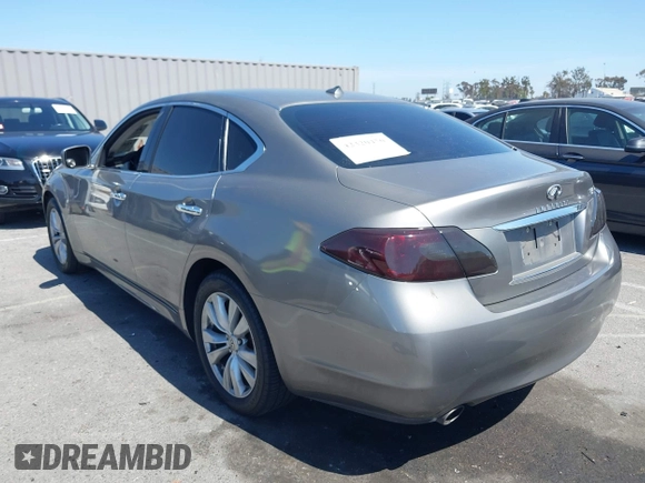 2011 Infiniti M with VIN JN1BY1AP7BM321776, listed as a IAAI auction lot 42320450 with 117,831 mi miles and . Bid and sale history available at DreamBid. Image 3.