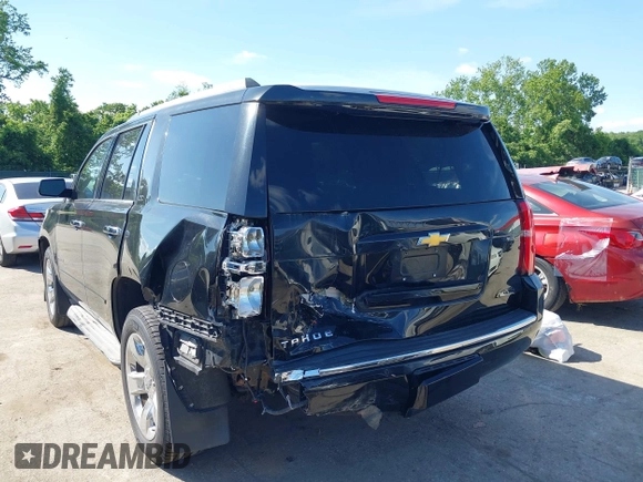 2015 Chevrolet Tahoe LTZ z VIN 1GNSKCKC3FR104845, wystawiony jako IAAI lot #42291785 z przebiegiem 75 047 mil mil oraz . Historia ofert i sprzedaży dostępna na DreamBid. Obrazek 17.