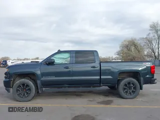 2017 Chevrolet Silverado 1500 LT with VIN 3GCUKREC7HG220780, listed as a IAAI auction lot 41978463 with 131,532 mi miles and . Bid and sale history available at DreamBid. Image 14.