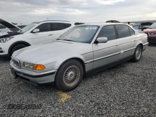1999 BMW 7 Series 740il with VIN WBAGH8334XDP05816, listed as a Copart auction lot 73872874 with 0 mi miles and Non Repairable. Bid and sale history available at carsss.com. Image 1.