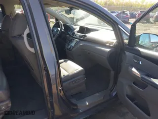 2016 Honda Odyssey EX-L with VIN 5FNRL5H65GB024360, listed as a IAAI auction lot 42005732 with 82,667 mi miles. Bid and sale history available at carsss.com. Image 5.