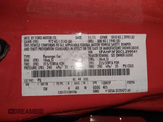 2012 Ford Focus SE with VIN 1FAHP3F20CL299541, listed as a IAAI auction lot 41948301 with 133,133 mi miles. Bid and sale history available at carsss.com. Image 9.